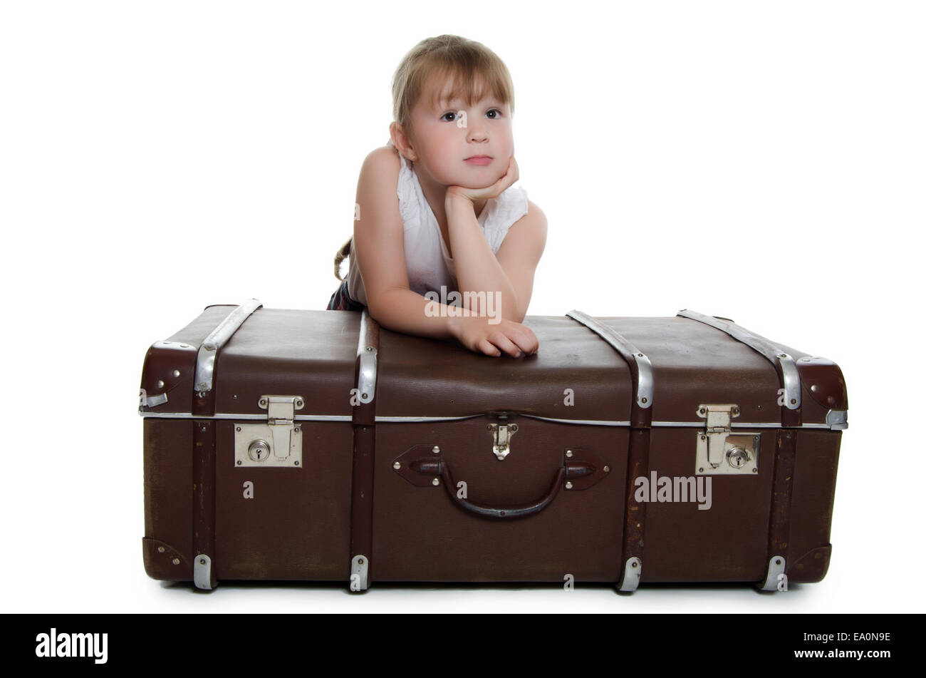 The little girl on old suitcases Stock Photo Alamy