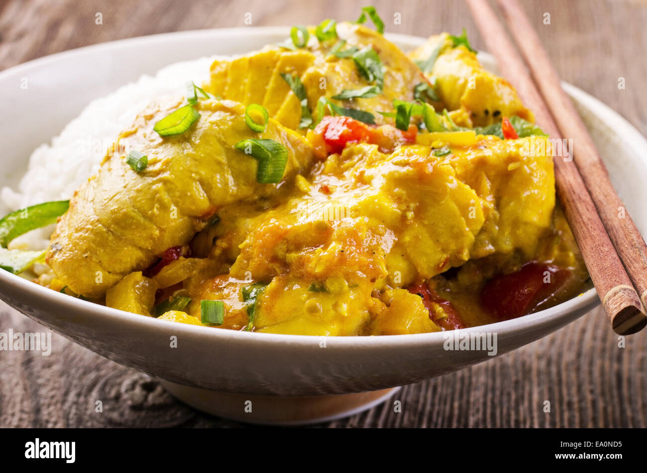 fish in coconut milk sauce Stock Photo - Alamy