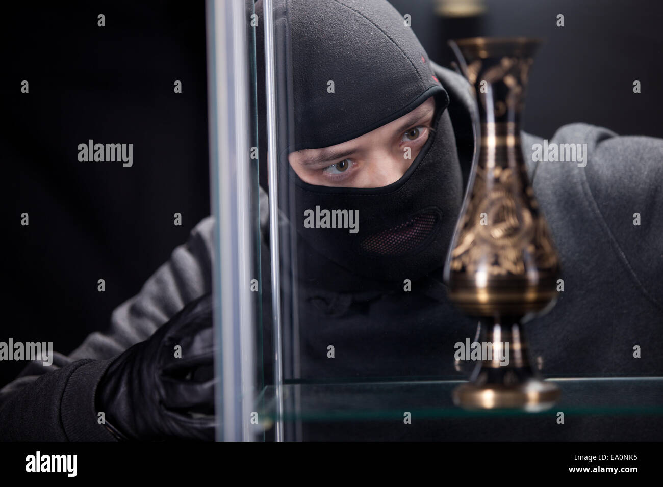 burglar wearing black mask Stock Photo - Alamy