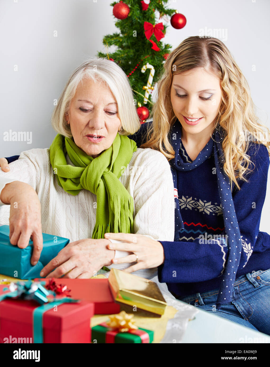 Senior woman packing hi-res stock photography and images - Alamy