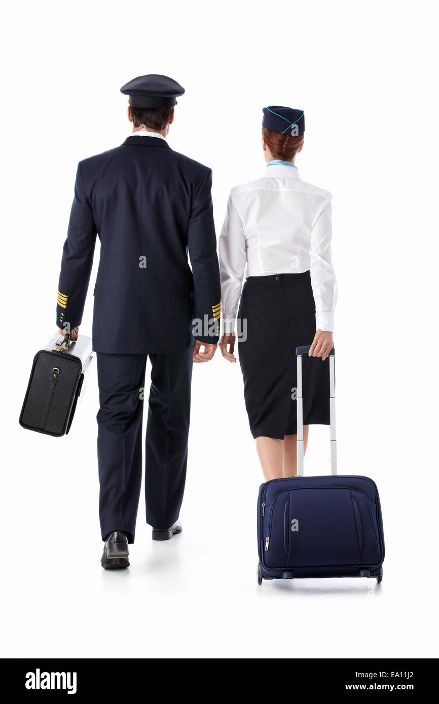 Female airline pilot walking hi-res stock photography and images - Alamy
