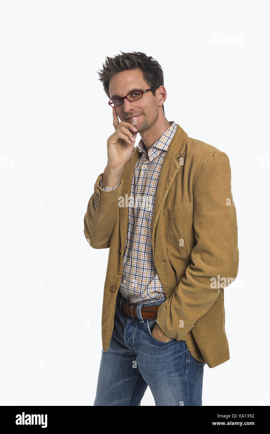 Pensive young man Stock Photo - Alamy
