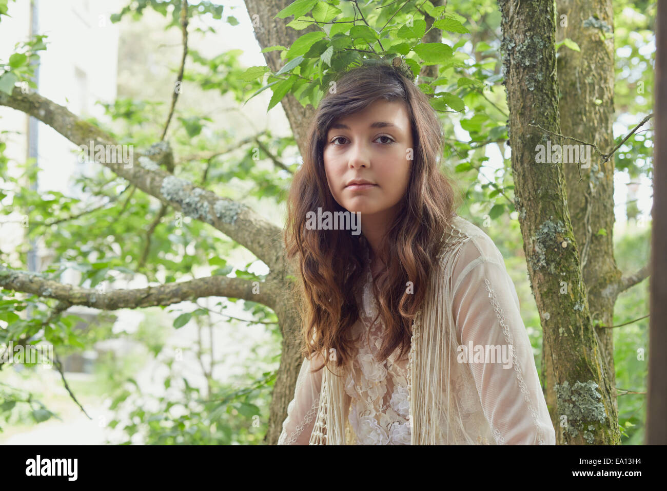 Portrait of young woman in woods Stock Photo - Alamy