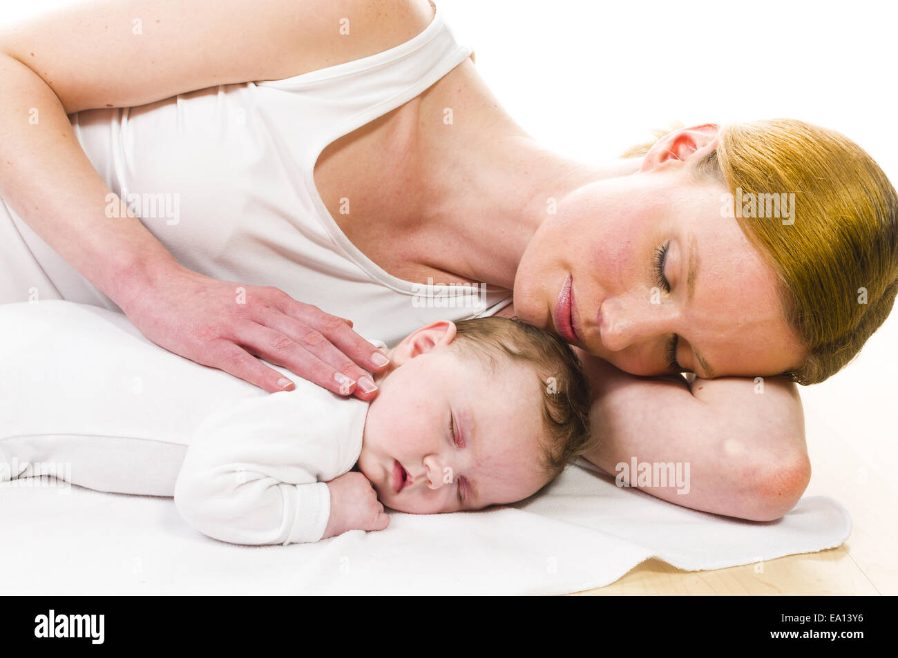 Newborn baby sleeping with mother Stock Photo Alamy