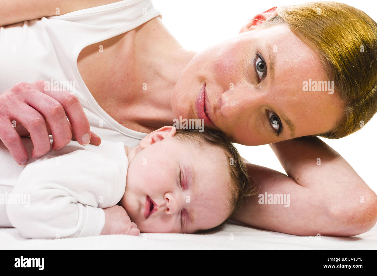 Newborn baby sleeping with mother Stock Photo Alamy