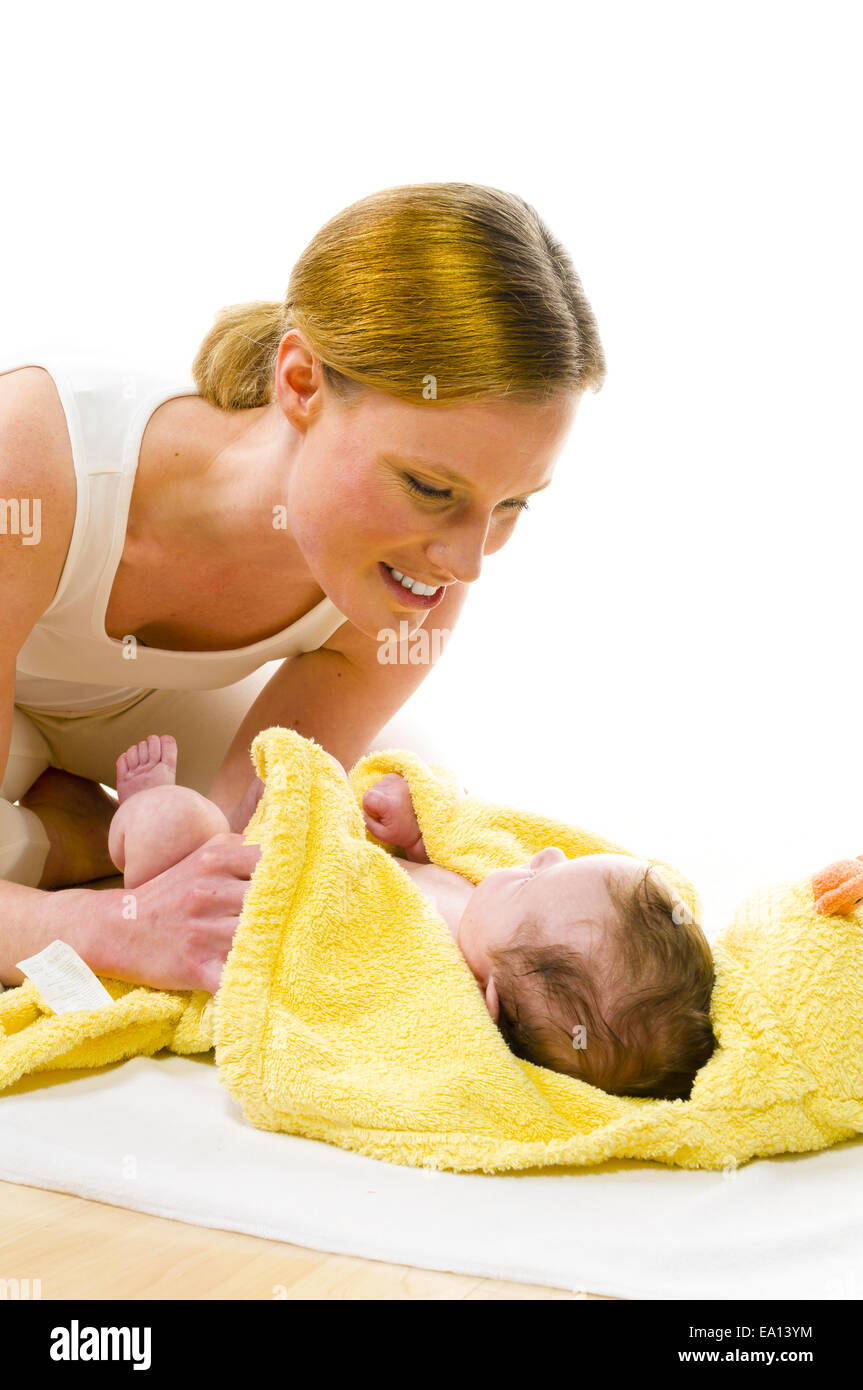 to towel down baby Stock Photo Alamy