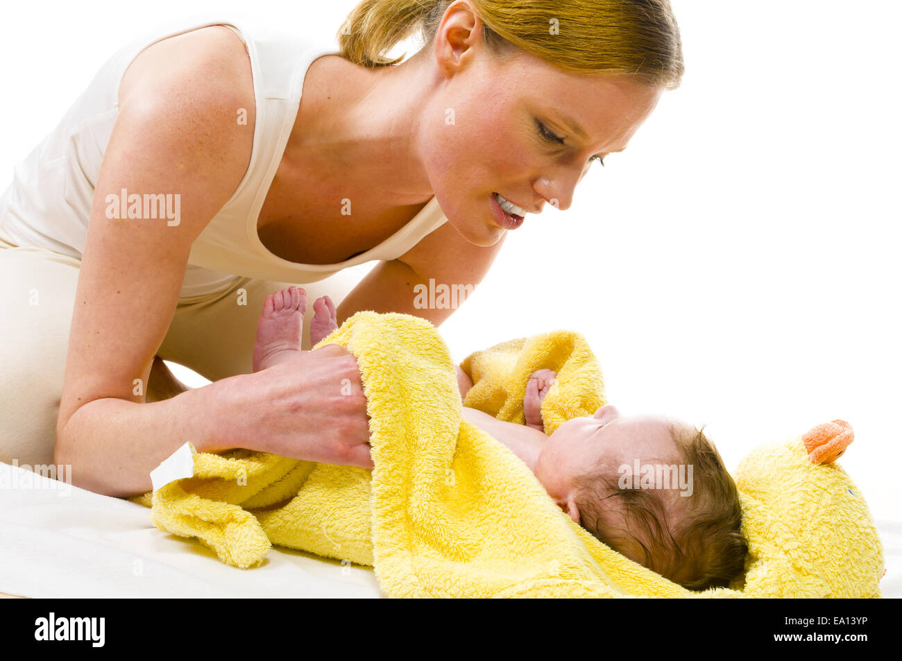 to towel down baby Stock Photo Alamy