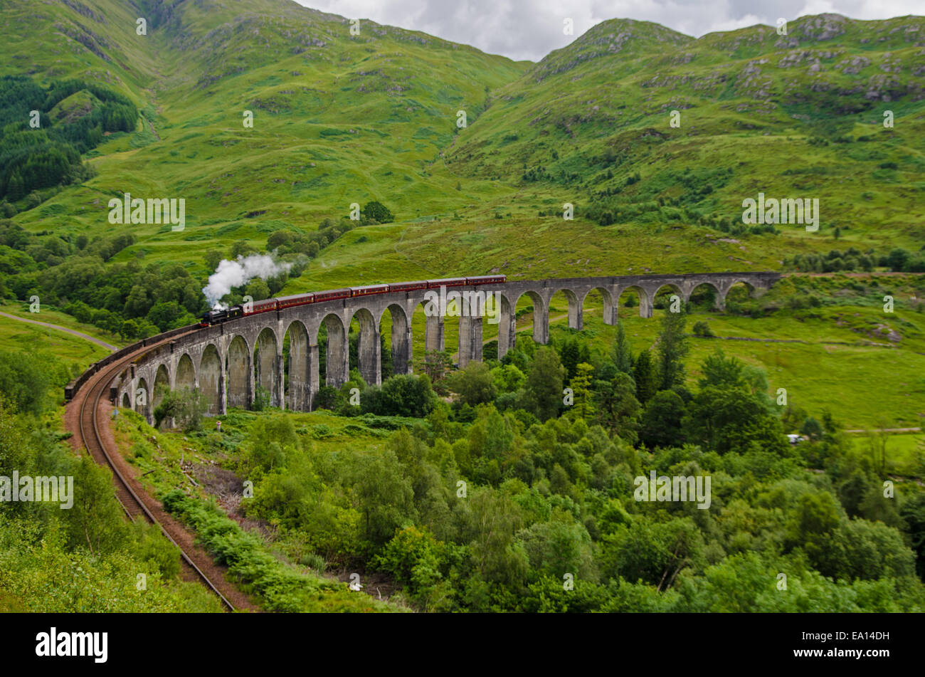 The Jacobite steam train crossing Glenfinnan viaduct Stock Photo Alamy