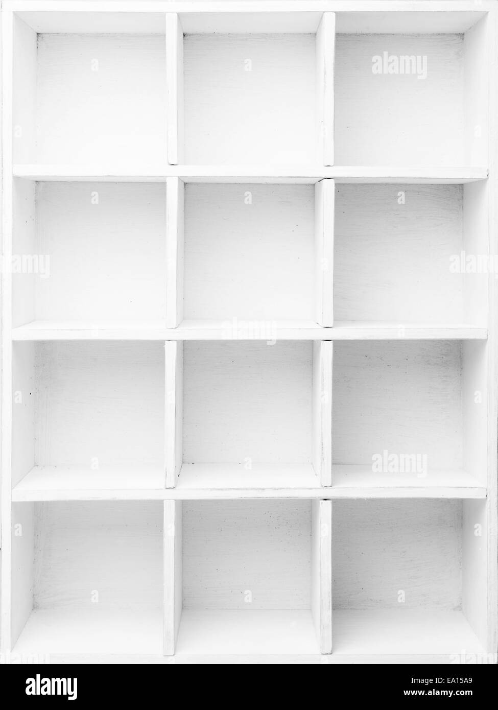 Empty Shelves in the white wooden rack Stock Photo