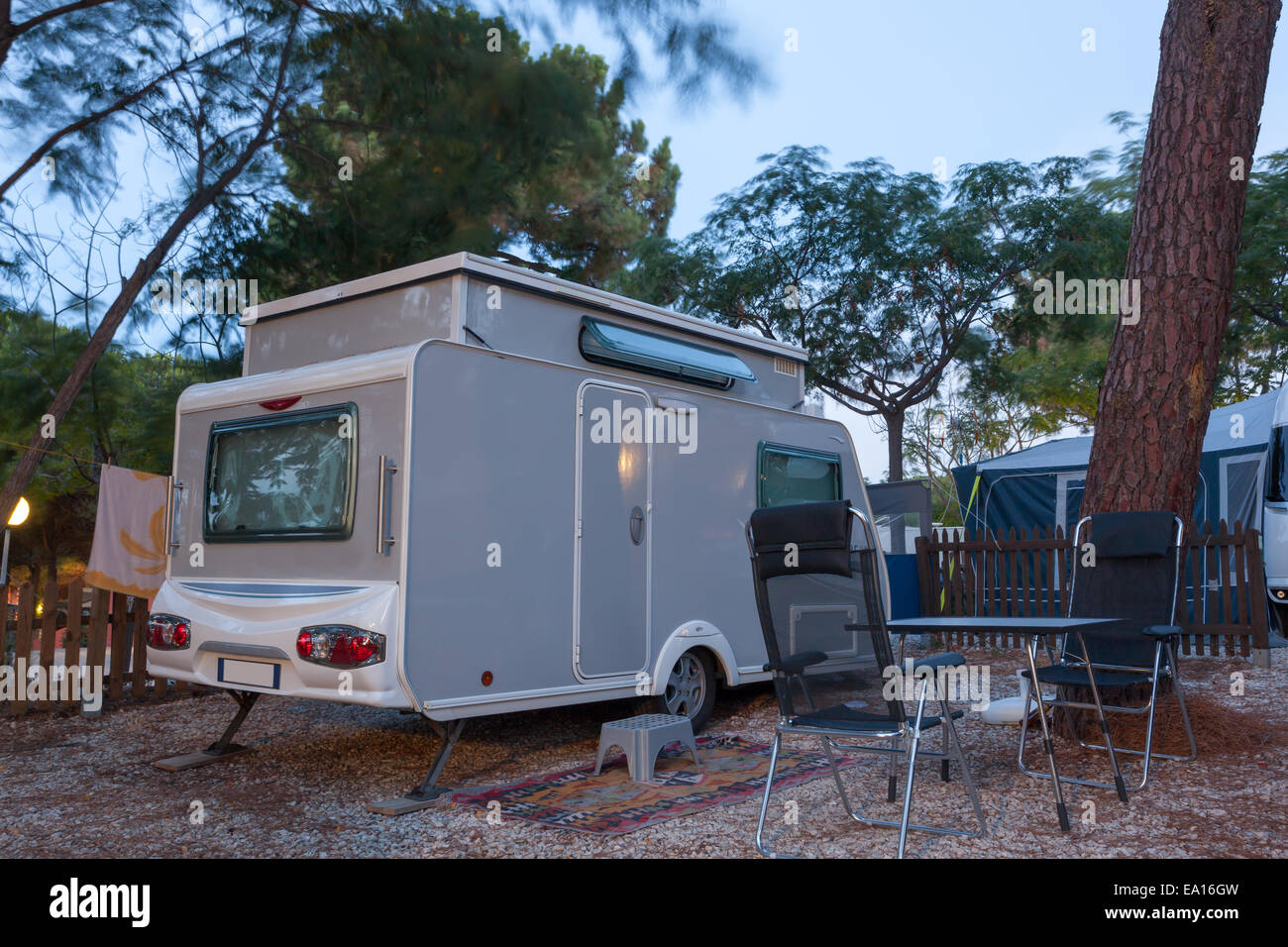 Caravan on a camping site at dusk. Andalusia, Spain Stock Photo