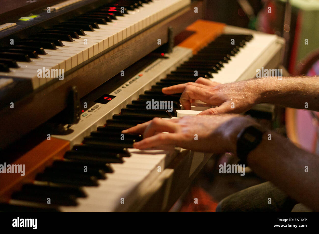 Hands on organ piano Stock Photo - Alamy