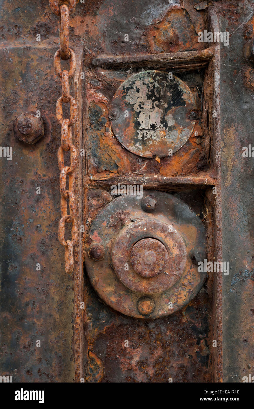 Detail of a piece of rusty machinery, Charlestown, St Austell, Cornwall. Stock Photo