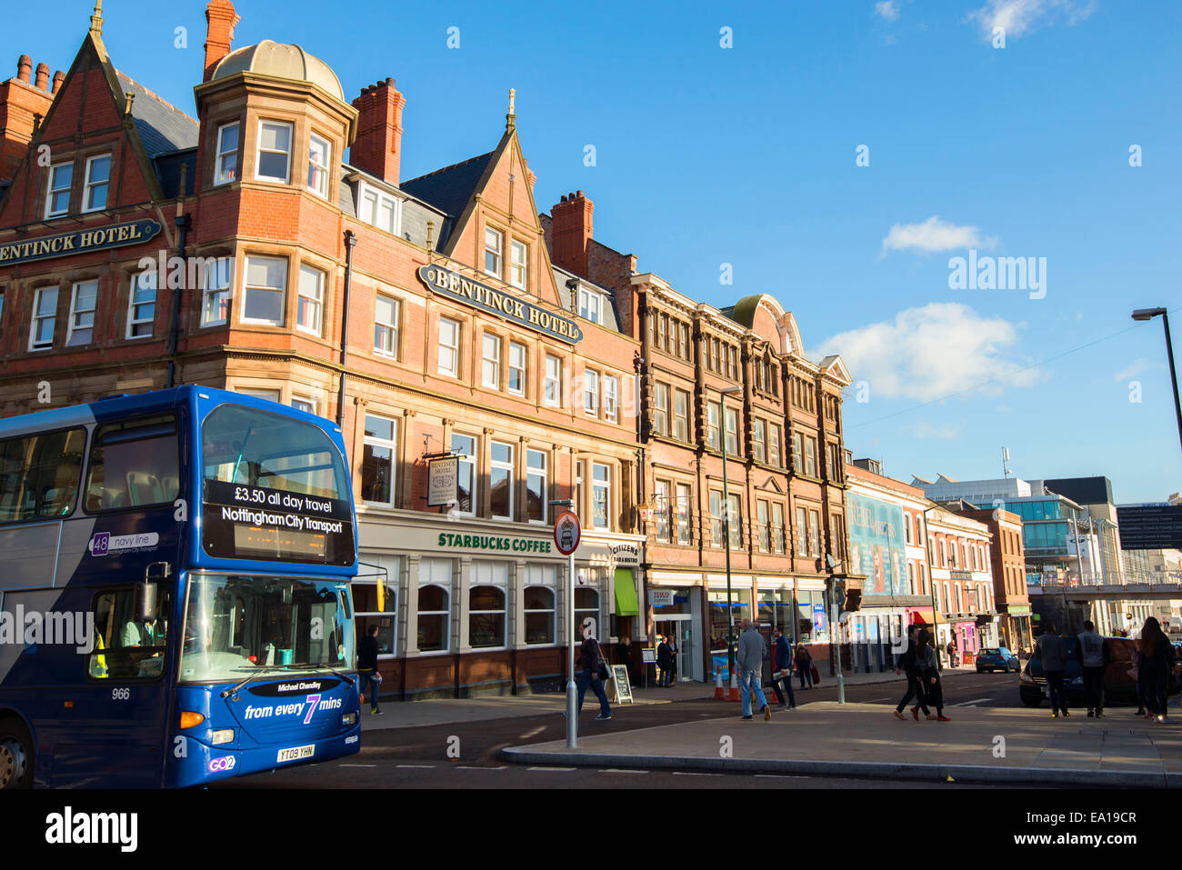 A bus crossing Station Street in Nottingham City, England UK Stock Photo