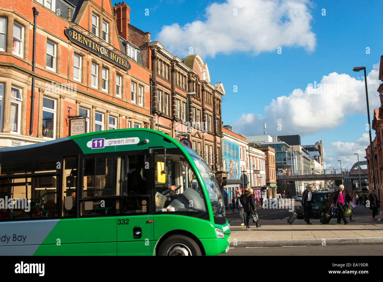 A bus crossing Station Street in Nottingham City, England UK Stock Photo