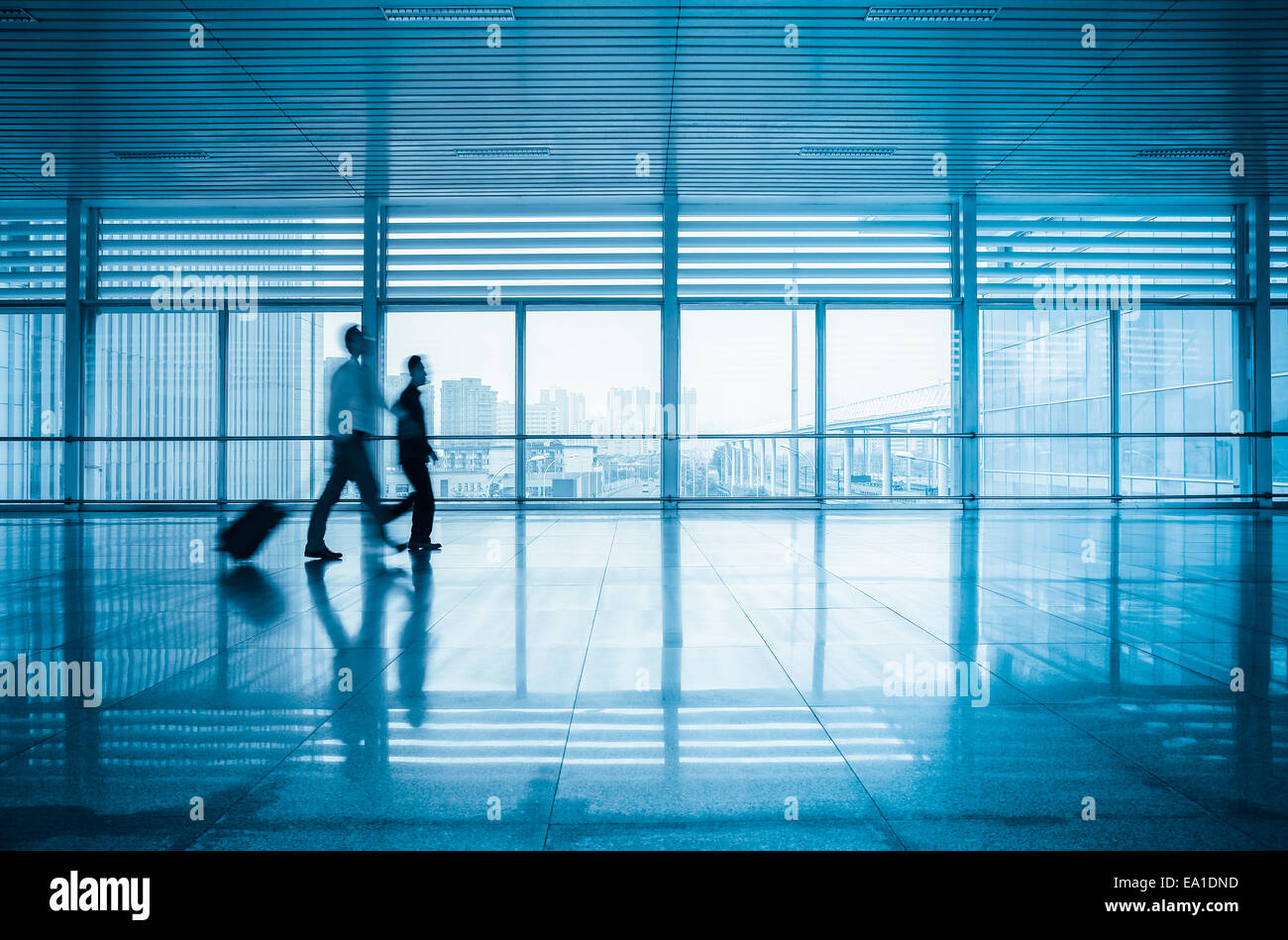 passengers motion blur in modern corridor Stock Photo