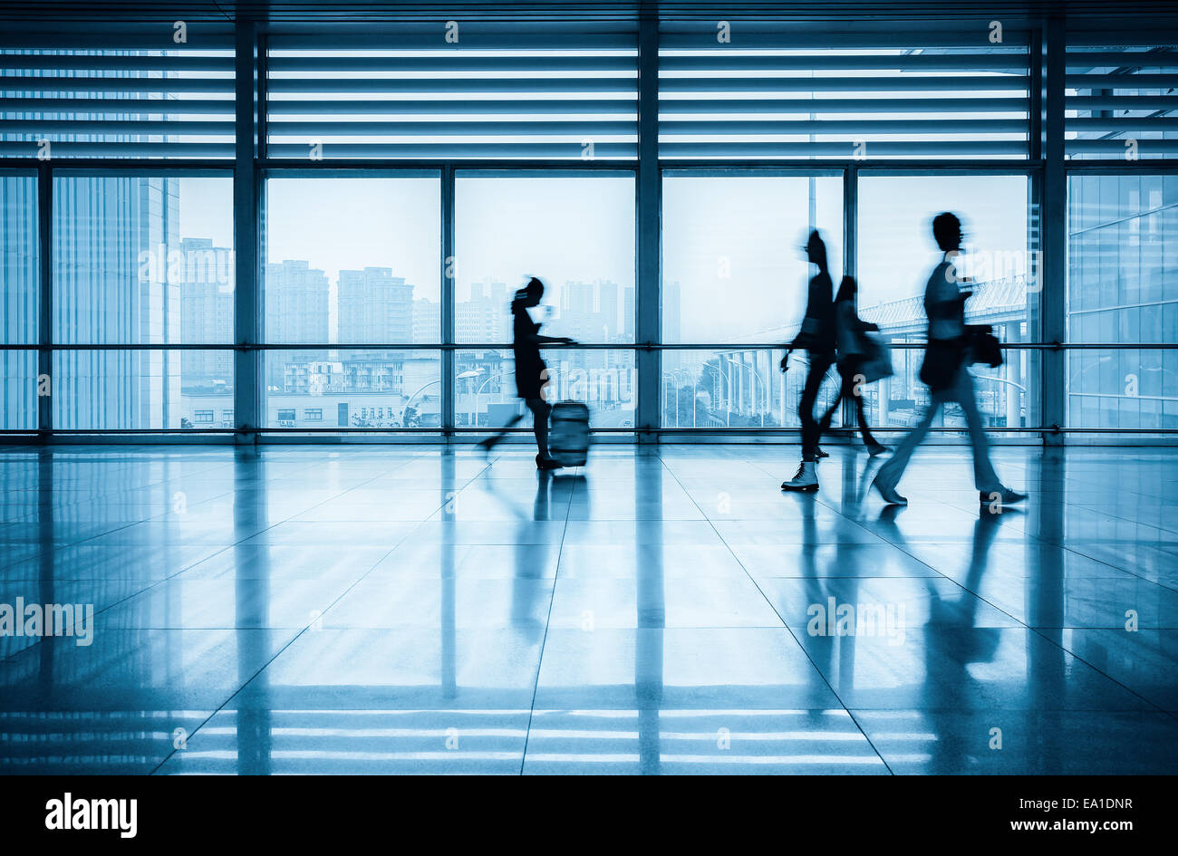 passengers motion blur in modern corridor Stock Photo