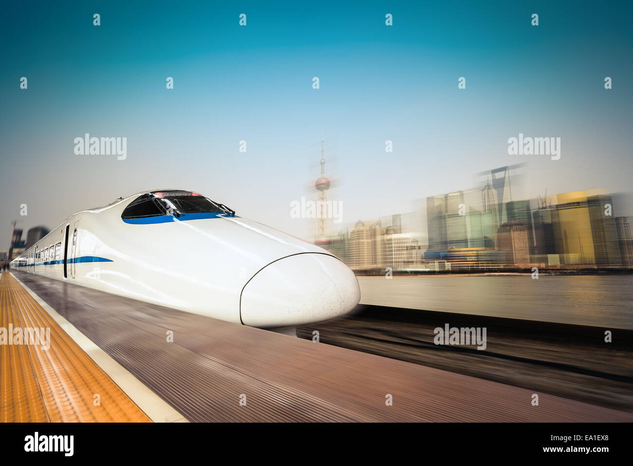 high speed train and modern urban background Stock Photo