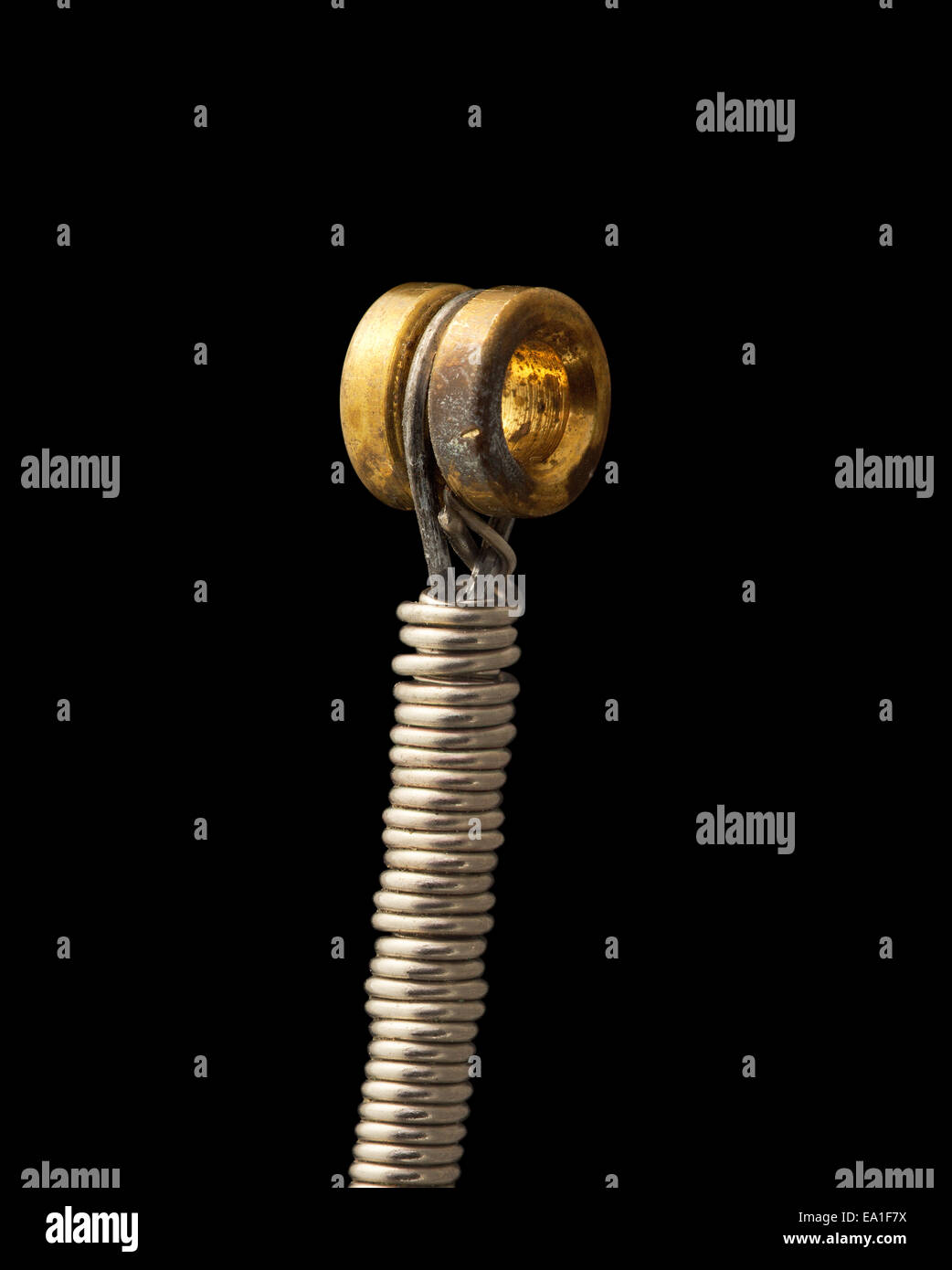 a guitar string or musical instrument string close up Stock Photo - Alamy