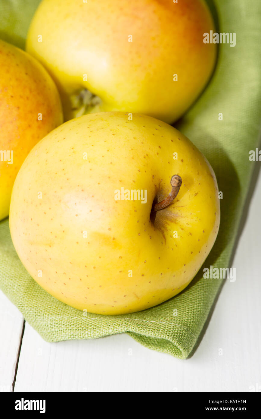 Apples on wooden table close up Stock Photo
