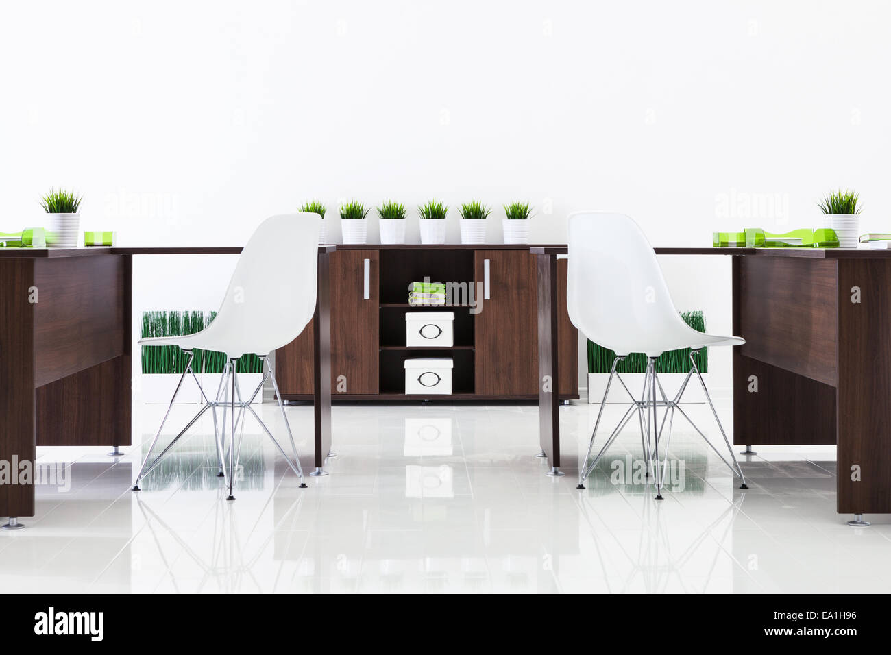 desks and plastic chairs Stock Photo Alamy