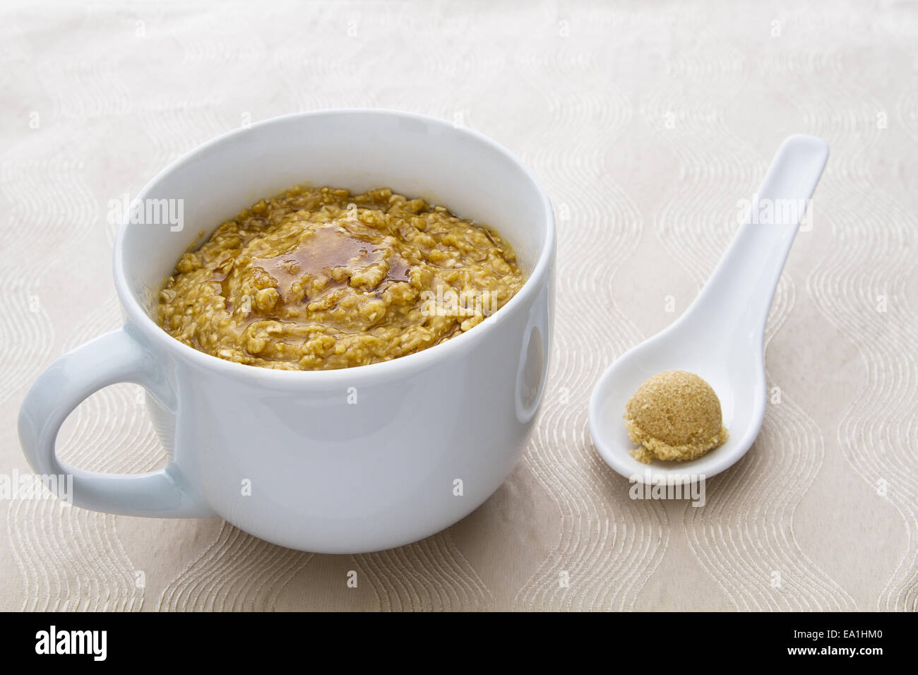 Oatmeal and maple syrup Stock Photo Alamy