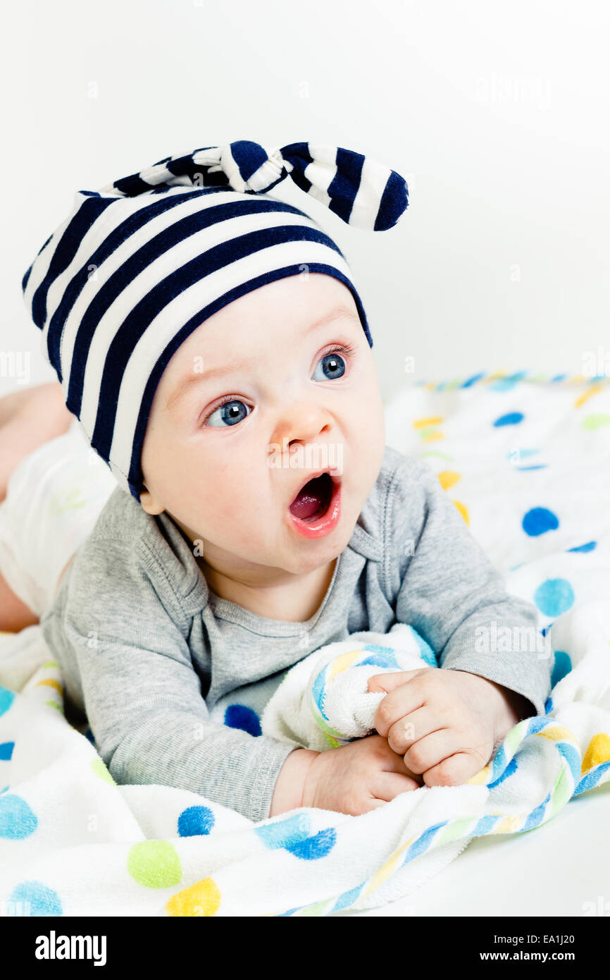 The blue-eyed baby yawning Stock Photo