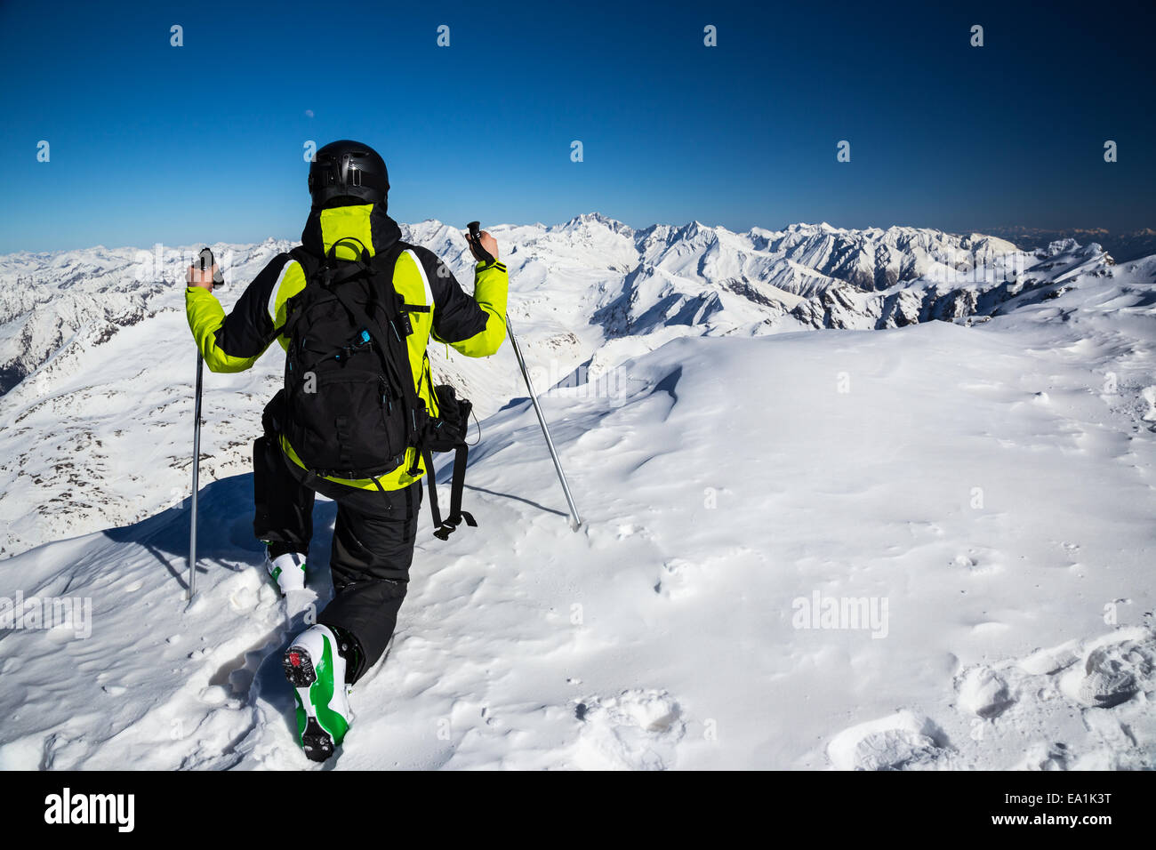 Freerider ready to running down slopes from the top of alpine mountains Stock Photo