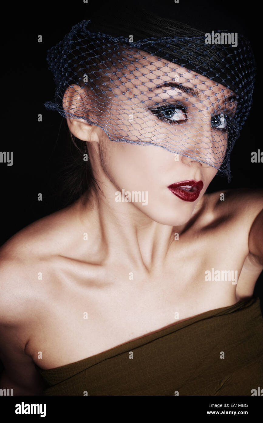 Portrait of beautiful young woman wearing veil and hat. retro Style ...