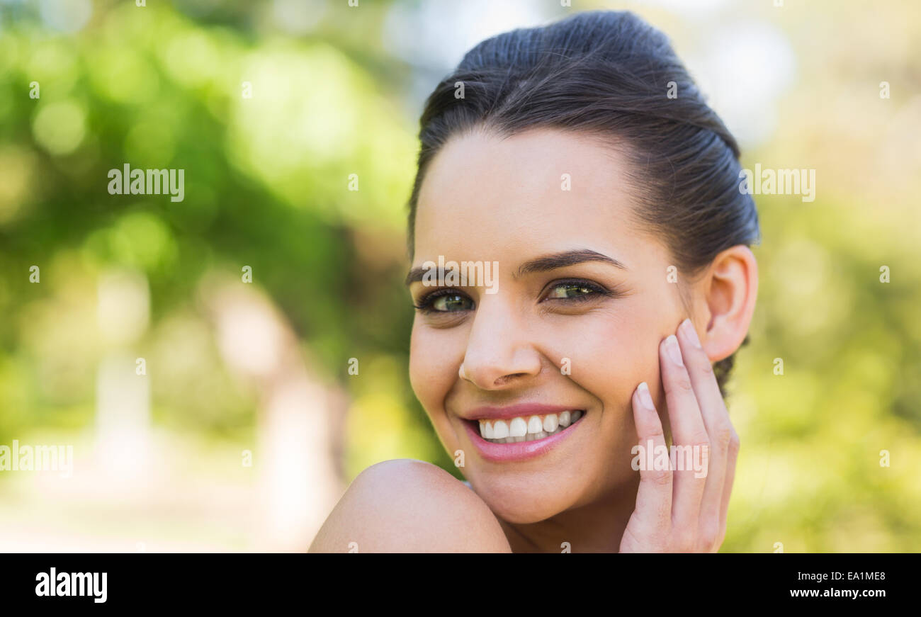 Close-up portrait of beautiful woman in park Stock Photo - Alamy