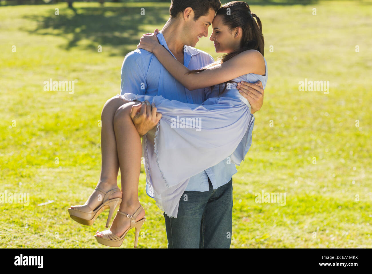 Romantic man carrying woman in hi-res stock photography and images - Page 2  - Alamy