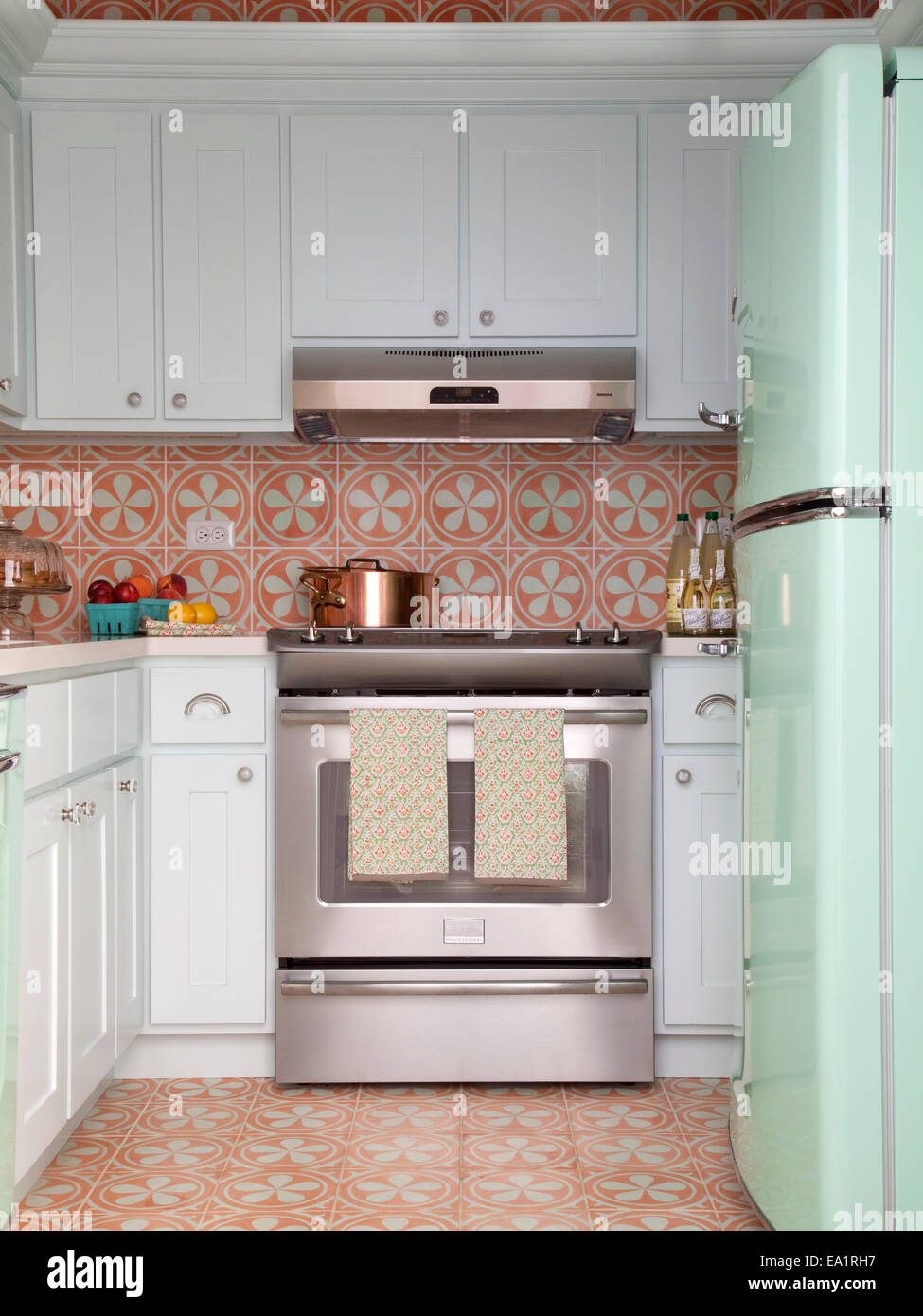small guest cottage kitchen with retro style refrigerator. Stock Photo