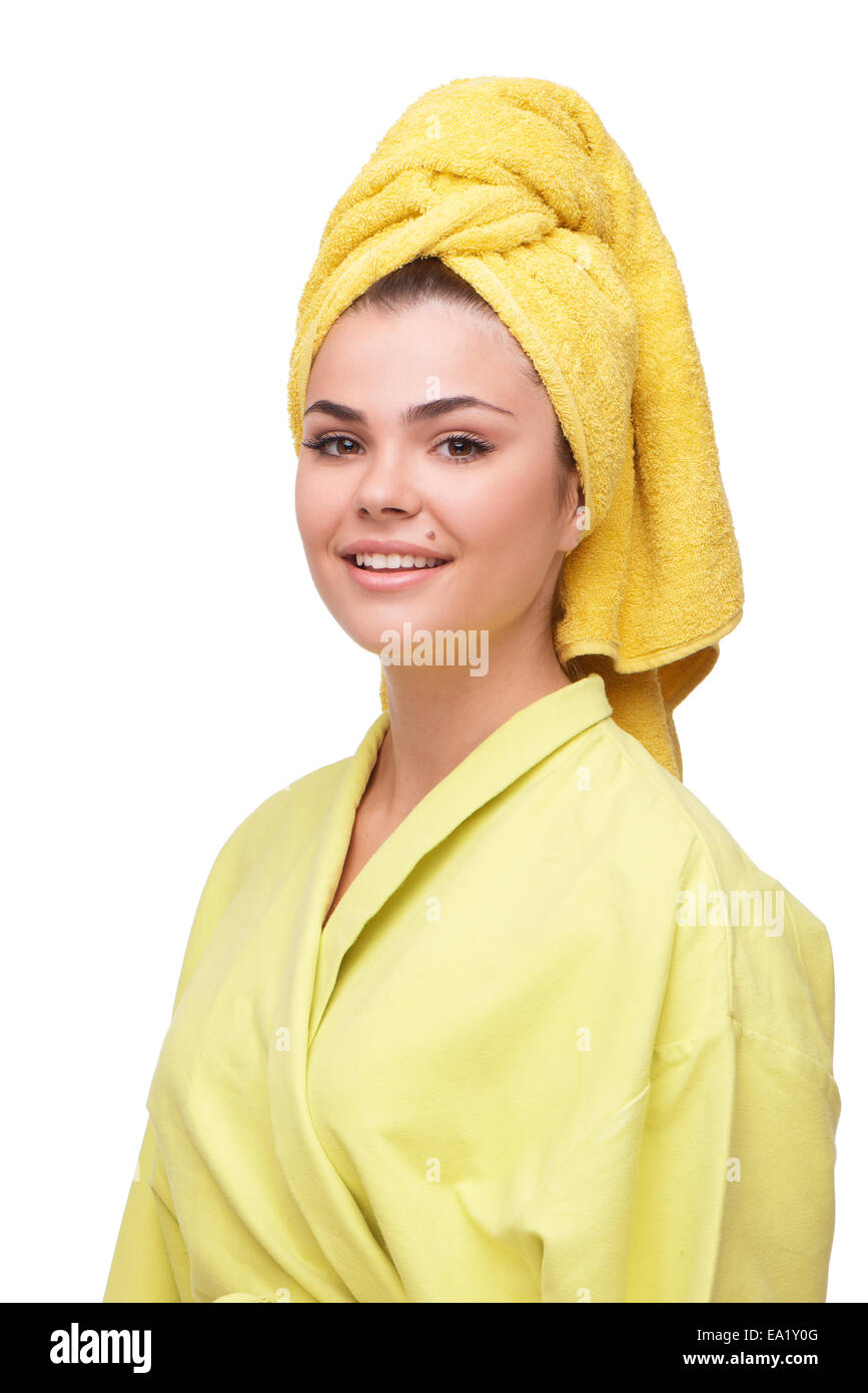Smiling young woman in bathrobe and towel Stock Photo - Alamy