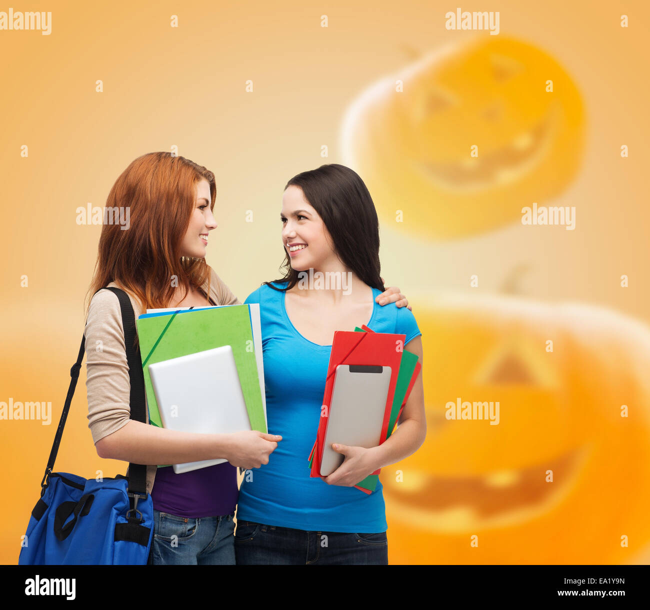 smiling student girl with books and bag Stock Photo - Alamy