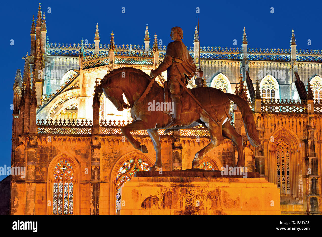 Portugal: Equestrian statue of Nuno Alvares Pereira and lateral view of the Monastery Santa Maria da Batalha Stock Photo