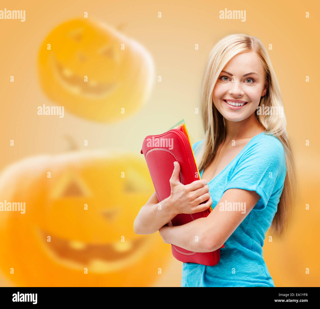 smiling student girl with books and tablet bag Stock Photo - Alamy