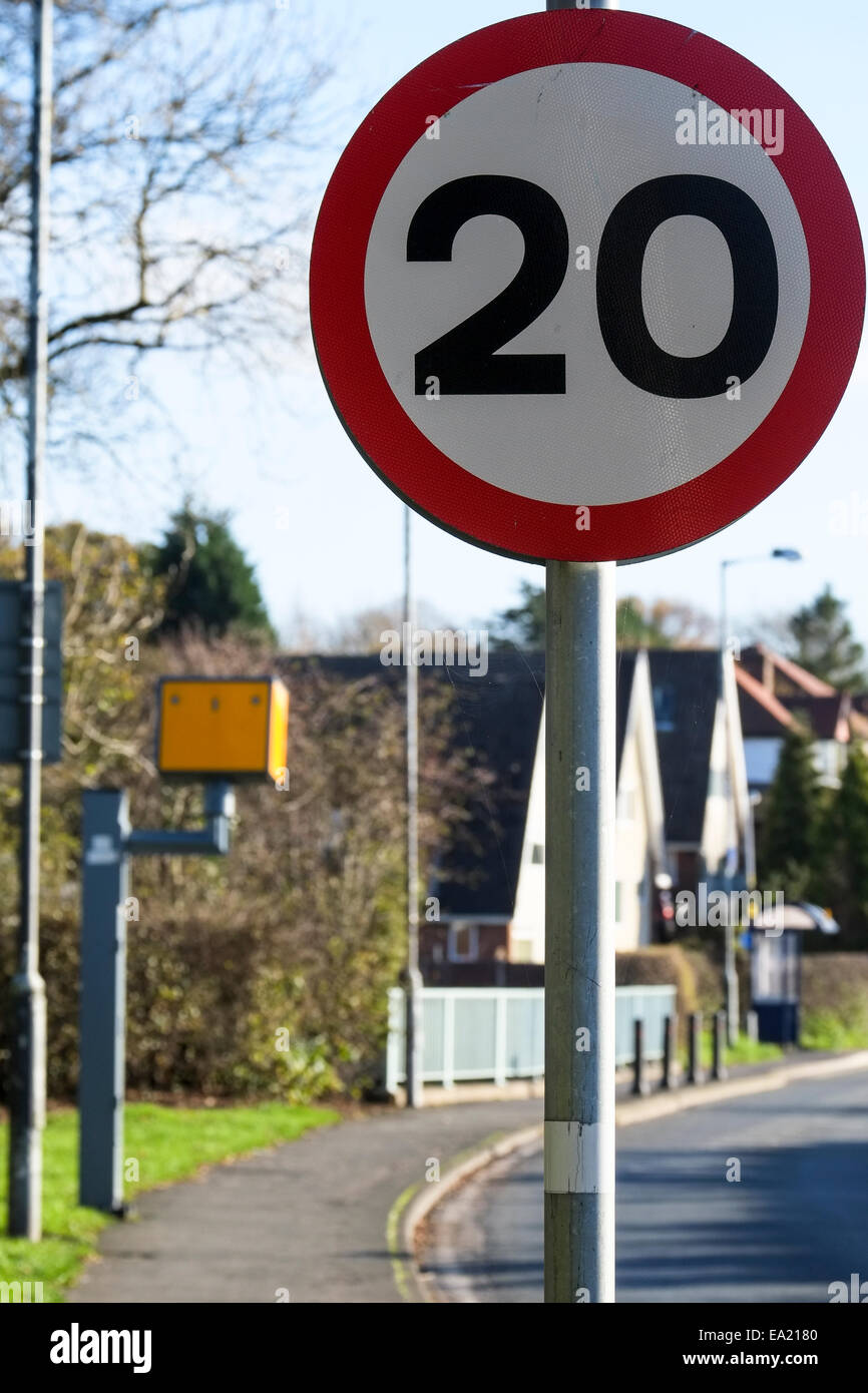 20 miles per hour (MPH) zone sign and speed camera Stock Photo