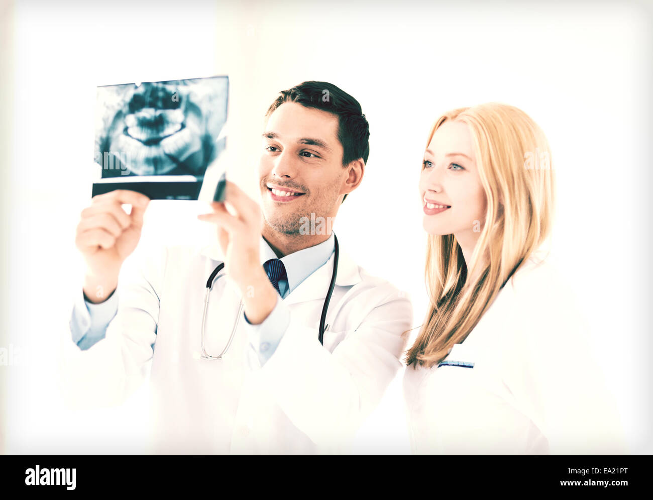 two doctors looking at x-ray Stock Photo - Alamy