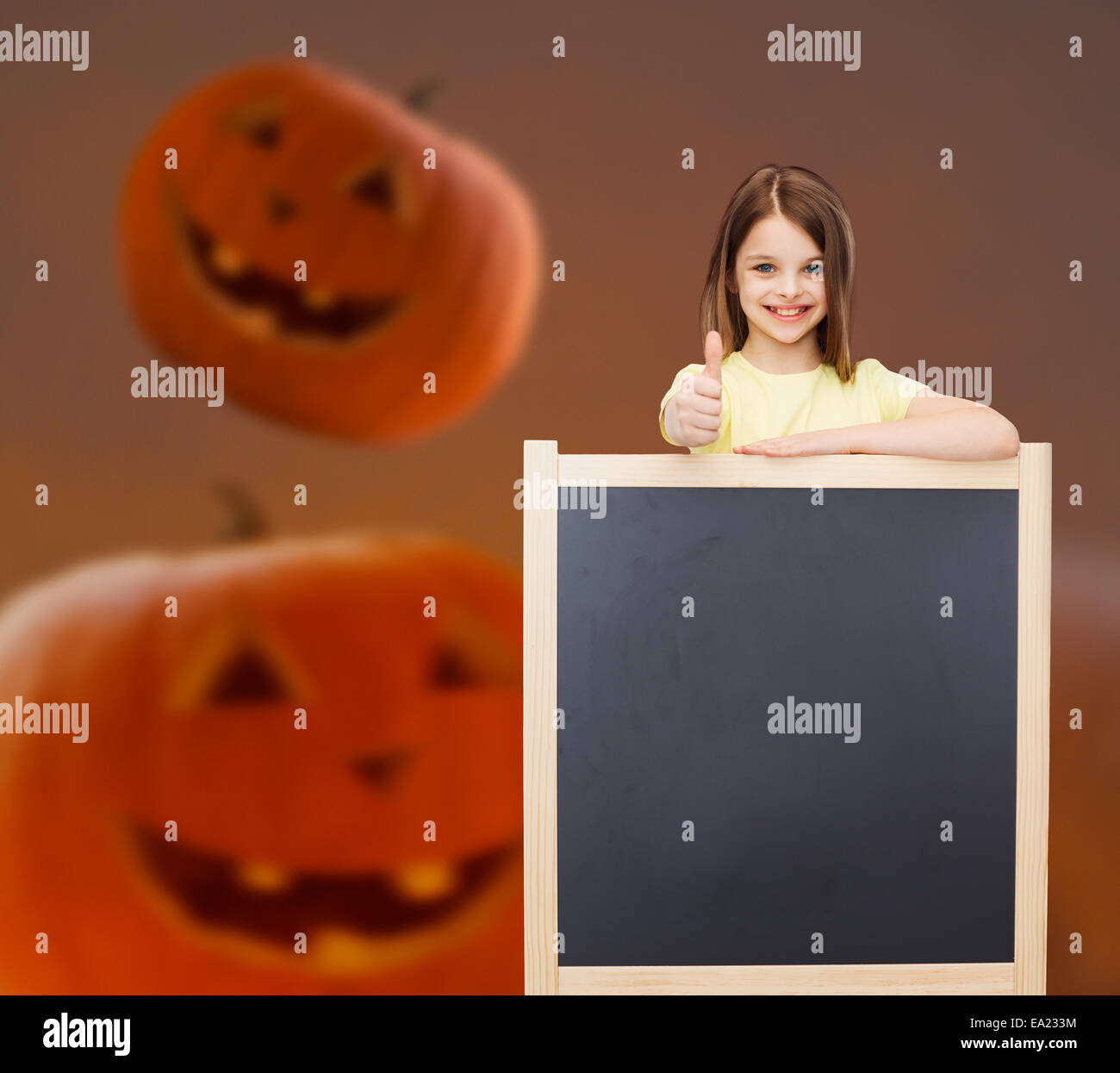 smiling little girl with blackboard Stock Photo - Alamy