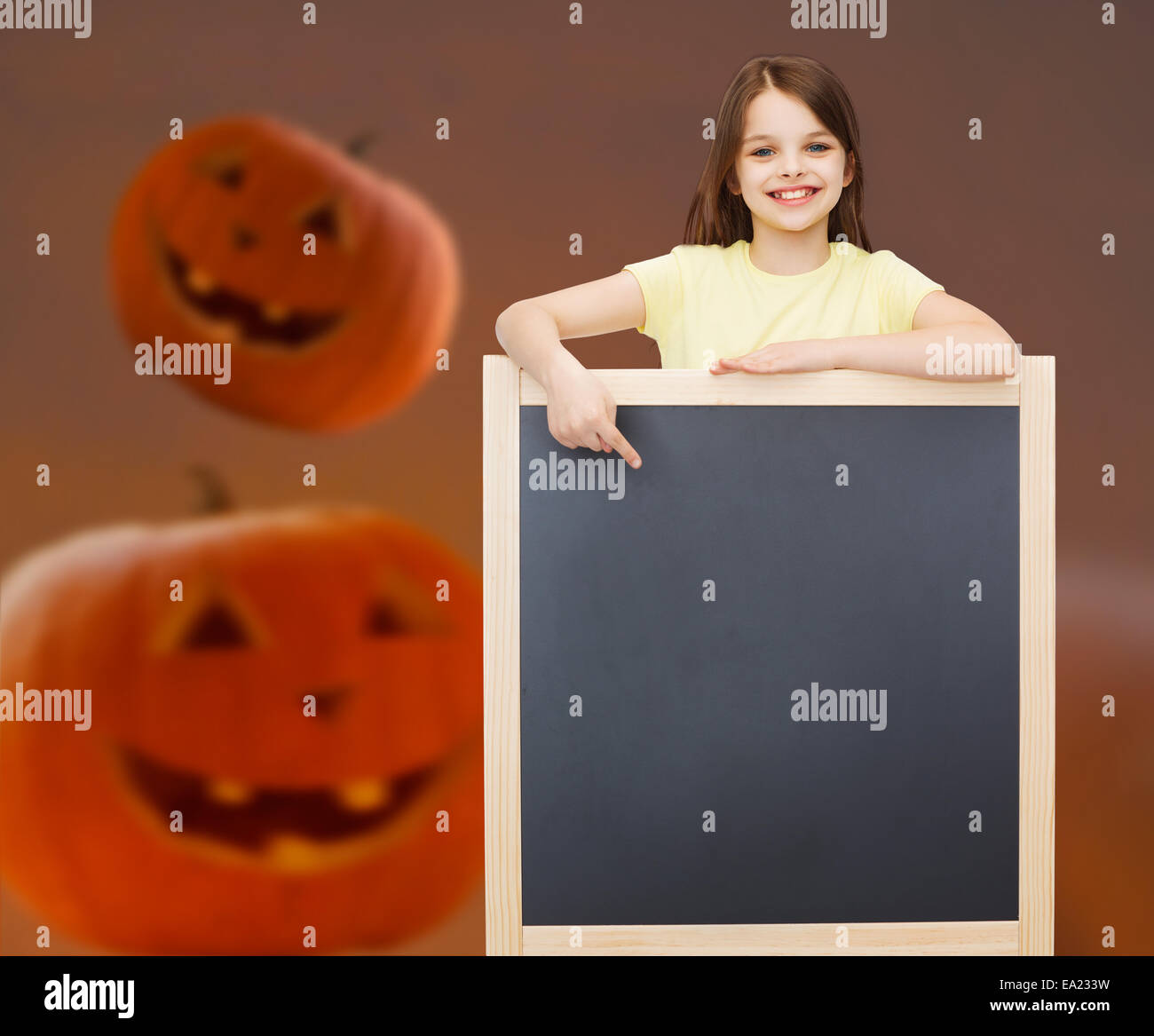 smiling little girl with blackboard Stock Photo - Alamy