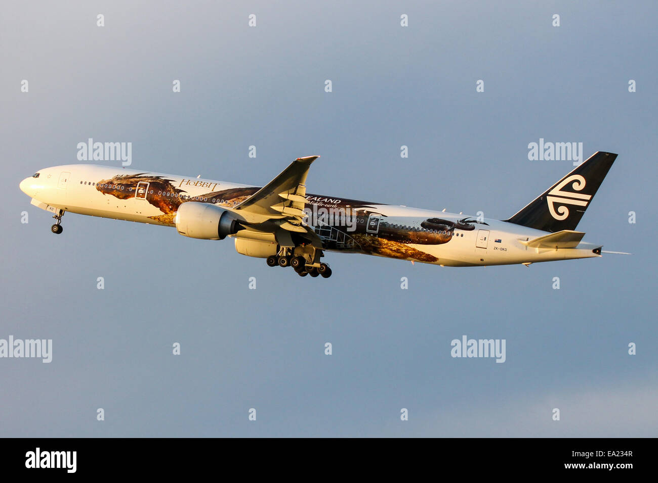Air New Zealand Boeing 777-300 climbs away from runway 27L at London Heathrow Airport. Stock Photo