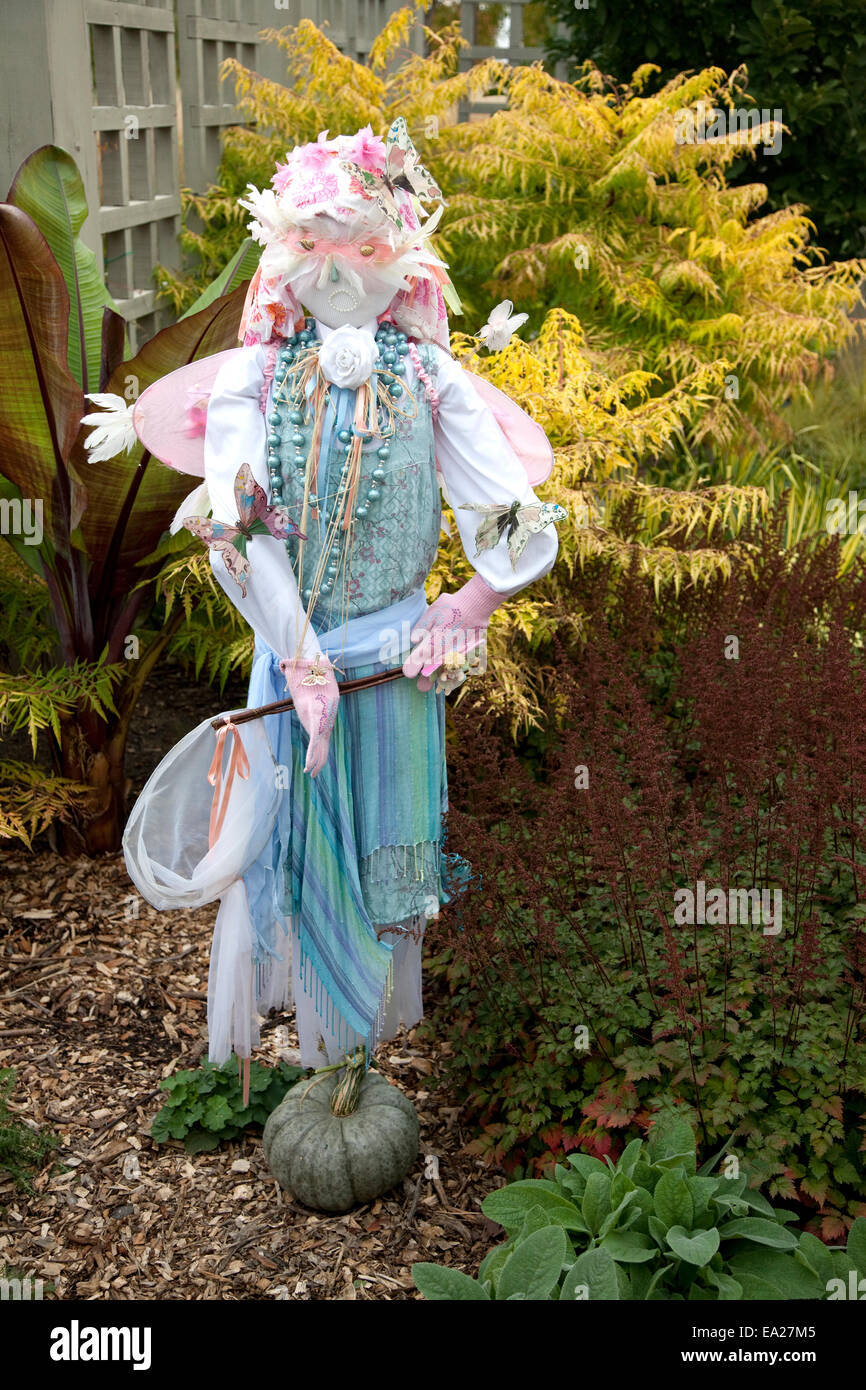 Full size Halloween figure dressed as a whimsical butterfly catcher.  Minnesota Arboretum, Chaska Minnesota MN USA Stock Photo - Alamy