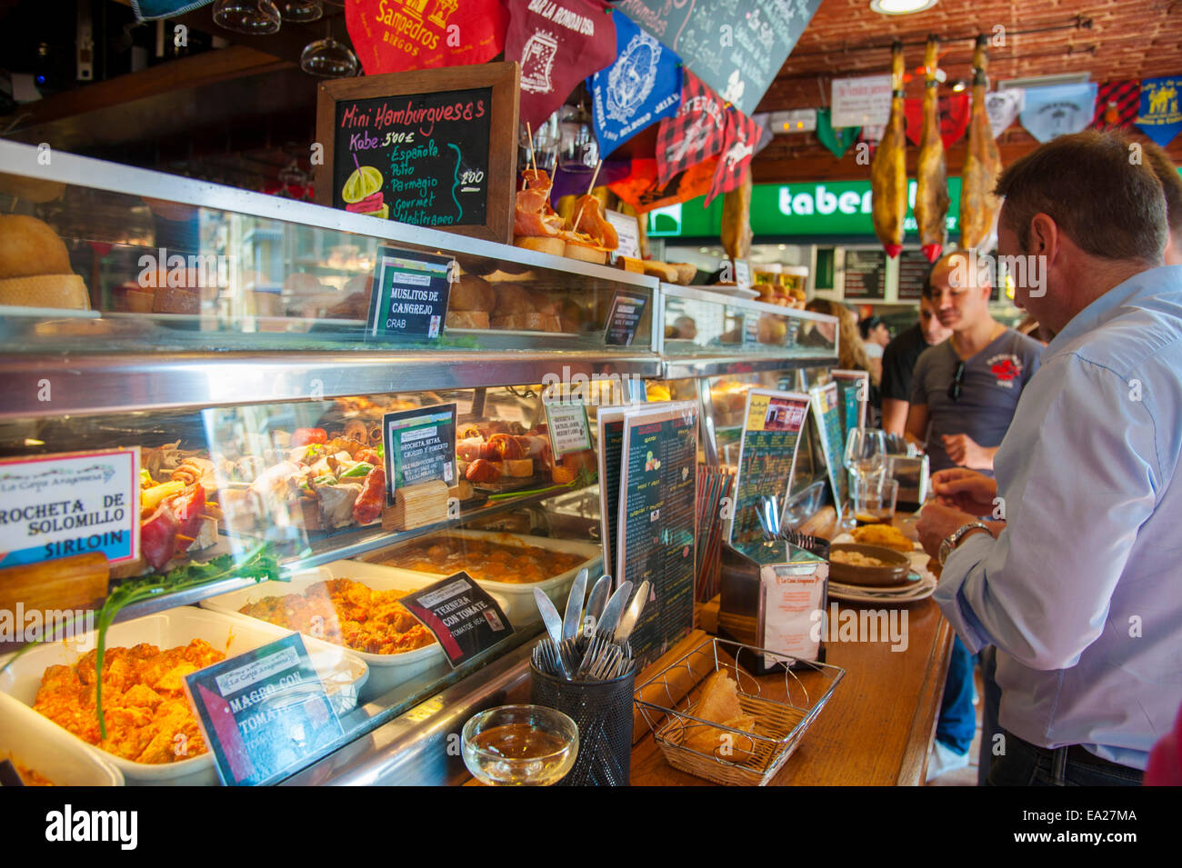 Tapas on display in the showcases of Tapas Restaurant   'Cava Aragonesa' in the old town of Benidorm on the Costa Blanca, Alican Stock Photo