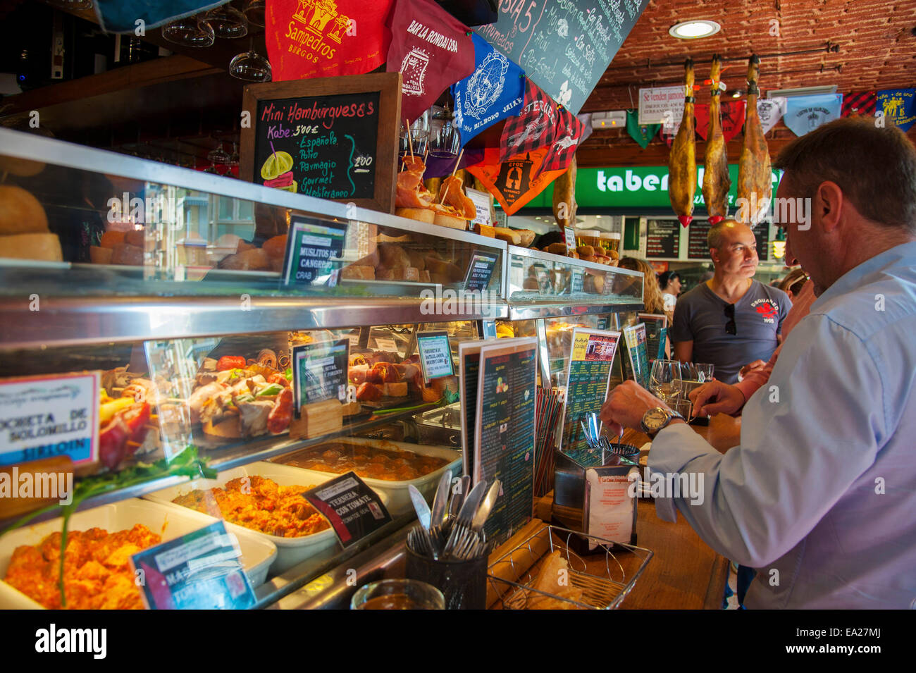 Tapas on display in the showcases of Tapas Restaurant   'Cava Aragonesa' in the old town of Benidorm on the Costa Blanca, Alican Stock Photo