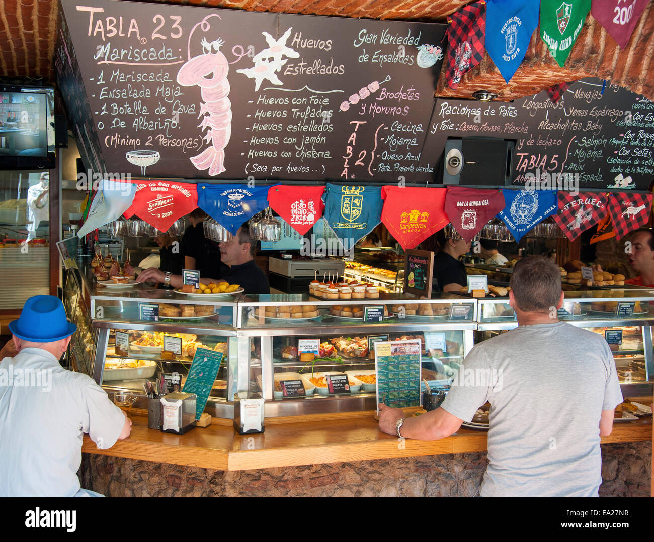 Tapas on display in the showcases of Tapas Restaurant "Cava Aragonesa" in  the old town of Benidorm on the Costa Blanca, Alican Stock Photo - Alamy