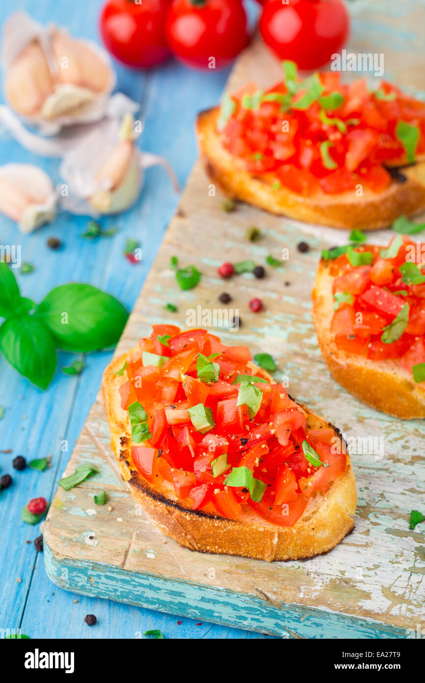 Italian tomato bruschetta with basil Stock Photo Alamy