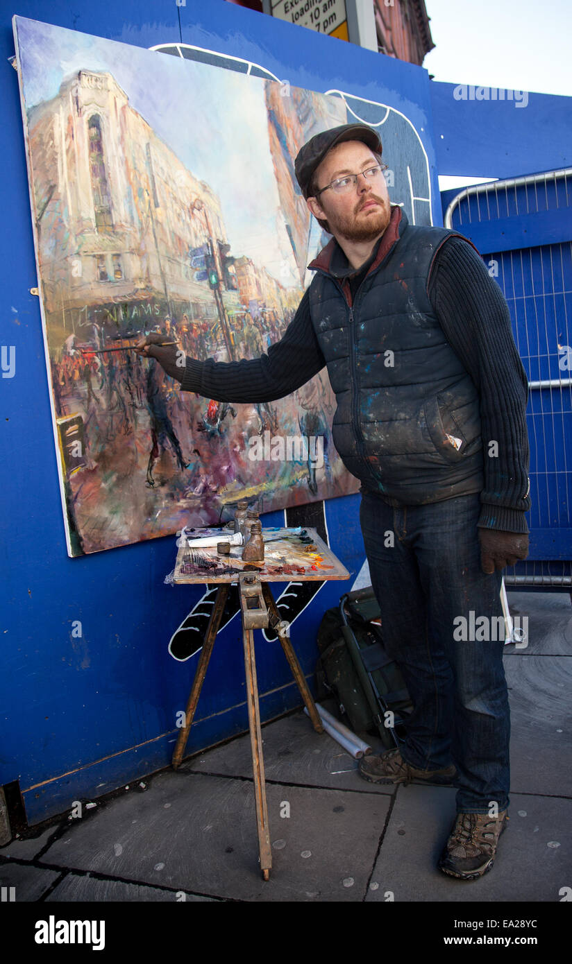 Urban Landscapes of Manchester, Rob Pointon, UK Plein Air artist, working  on a themed oil painting, street scenes painted in the city centre, Market  St, Manchester. Painting outdoors artwork to be exhibited