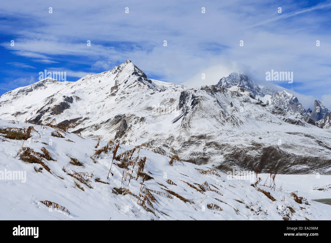 Rugged snow covered mountains, viewed from Little St Bernard Pass; Italy Stock Photo