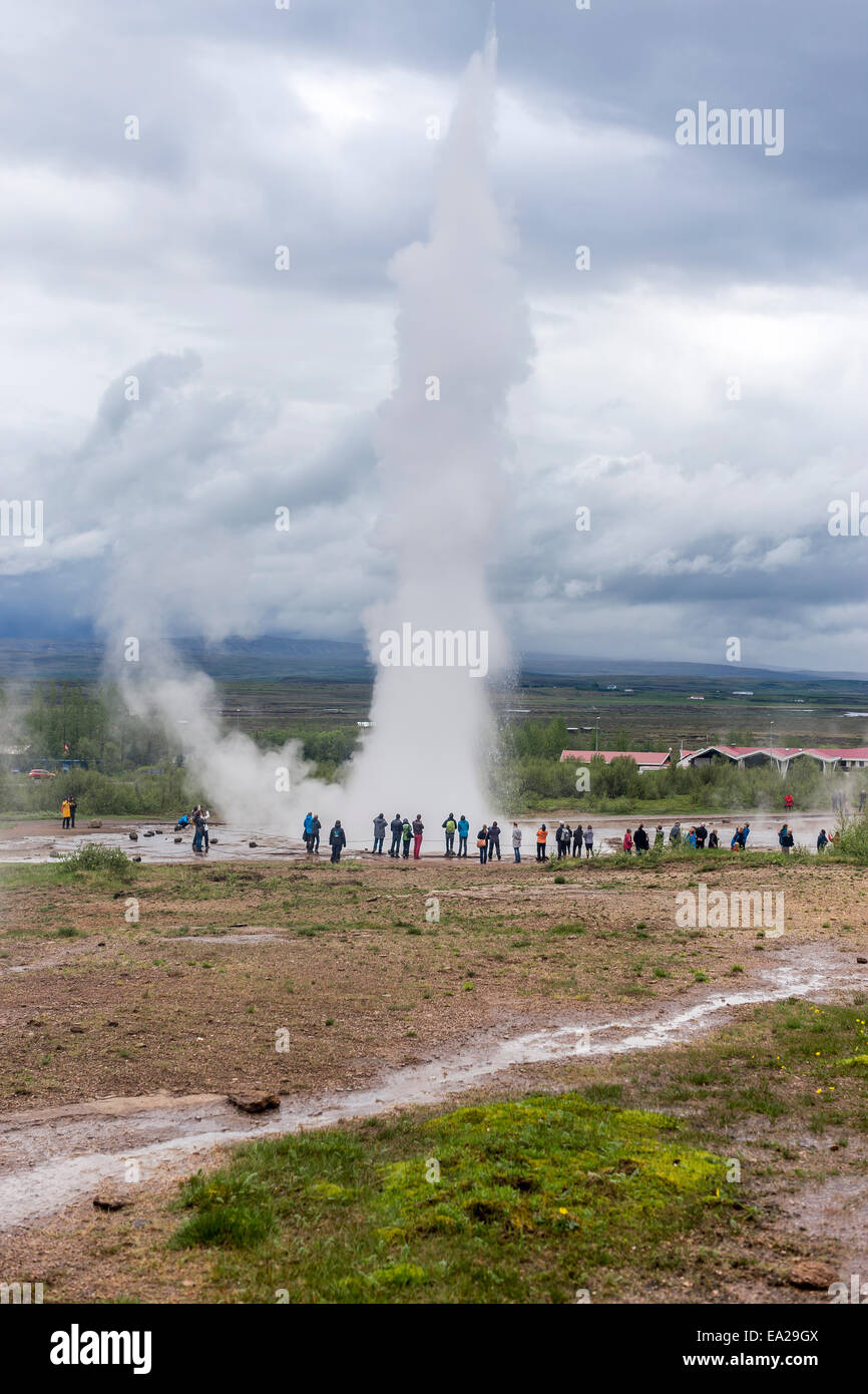 Strokkur (Icelandic for 'The Churn') is a geyser in the geothermic region beside the Hvítá River in Iceland. Stock Photo