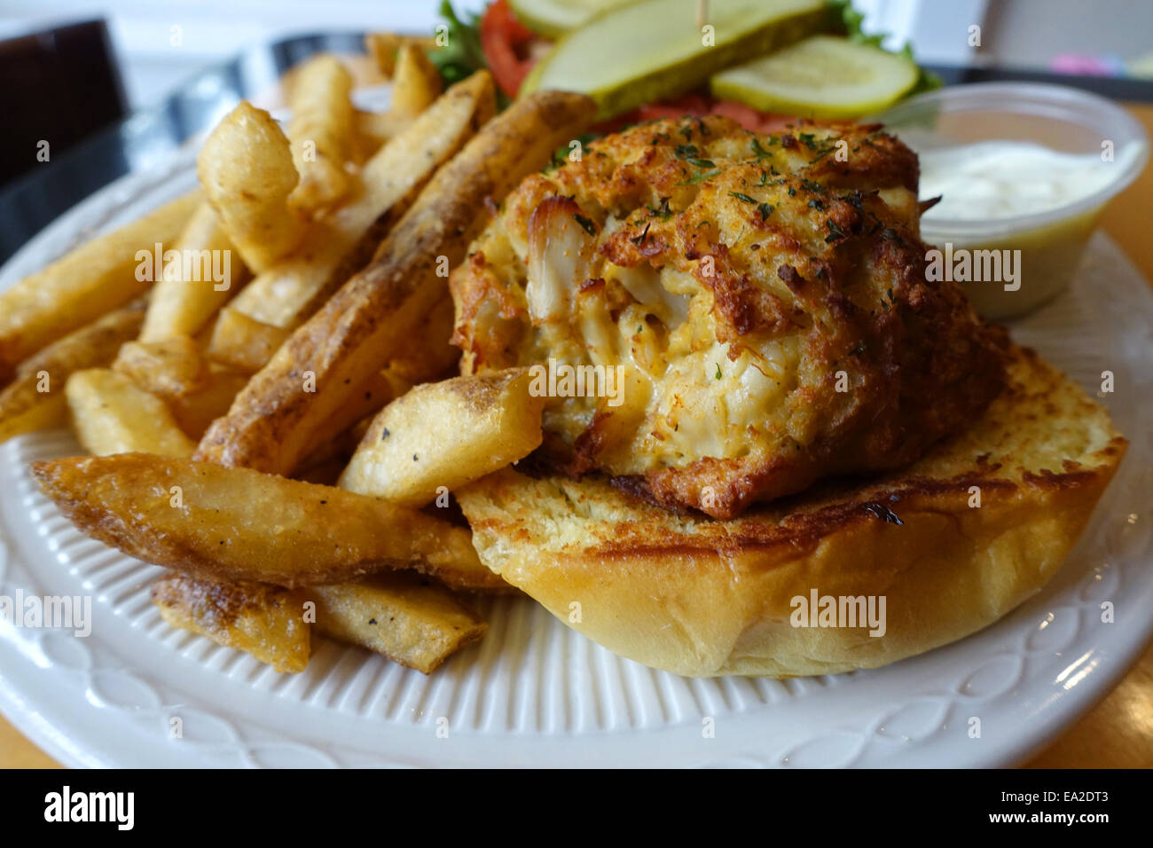 USA Maryland Food Crab Cake sandwich with French fries at JR's Past Time Pub Chestertown MD on