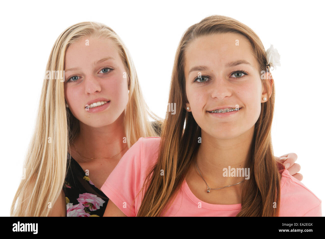Teen girlfriends together isolated over white background Stock Photo